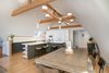 Modern home with Dining Room, Bench, Table, Chair, Bar, Stools, Storage, Ceiling Lighting, and Medium Hardwood Floor. Kitchen and dining rooms Photo 7 of Bayview Road