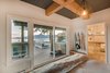 Modern home with Bedroom, Ceiling Lighting, and Medium Hardwood Floor. Master bedroom Photo 12 of Bayview Road