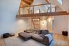 Modern home with Living Room, Sofa, Ceiling Lighting, Standard Layout Fireplace, Medium Hardwood Floor, and Gas Burning Fireplace. Den and upper walkway Photo 10 of Bayview Road