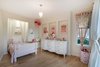 Modern home with Bedroom, Bed, Dresser, Wardrobe, Night Stands, Ceiling Lighting, and Medium Hardwood Floor. Second Bedroom Photo 18 of Bayview Road