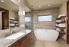 Modern home with Bath Room, Granite Counter, Undermount Sink, Freestanding Tub, Limestone Floor, Open Shower, Recessed Lighting, and Stone Tile Wall. Master Bathroom Photo 12 of La Jolla Modern