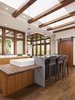 Modern home with Kitchen, Granite Counter, Wood Cabinet, Engineered Quartz Counter, Wood Counter, Medium Hardwood Floor, Ceiling Lighting, Stone Slab Backsplashe, Accent Lighting, Recessed Lighting, Pendant Lighting, Undermount Sink, and Dishwasher. La Jolla Kitchen Remodel Photo 5 of La Jolla Modern