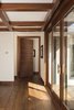 Modern home with Hallway and Medium Hardwood Floor. Door leading to Master Suite Photo 15 of La Jolla Modern