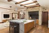 Modern home with Kitchen, Wood Cabinet, Engineered Quartz Counter, Granite Counter, Wood Counter, Medium Hardwood Floor, Stone Slab Backsplashe, Ceiling Lighting, Pendant Lighting, Wall Lighting, Range, Accent Lighting, Recessed Lighting, Range Hood, and Undermount Sink. Open Concept Kitchen Remodel Photo 6 of La Jolla Modern