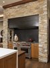 Modern home with Kitchen, Granite Counter, Engineered Quartz Counter, Wood Counter, Metal Backsplashe, Medium Hardwood Floor, Wood Cabinet, Range, and Range Hood. Custom Metal Hood + Stone Wall Photo 7 of La Jolla Modern