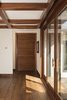 Modern home with Hallway and Medium Hardwood Floor. Door leading into Master Suite Photo 14 of La Jolla Modern