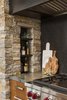 Modern home with Kitchen, Engineered Quartz Counter, Wood Cabinet, Granite Counter, Medium Hardwood Floor, Range Hood, Metal Backsplashe, and Range. Range Detail Shot Photo 8 of La Jolla Modern
