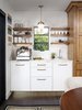 Modern home with Kitchen, Marble Counter, White Cabinet, Wood Cabinet, Medium Hardwood Floor, Subway Tile Backsplashe, Pendant Lighting, Dishwasher, and Undermount Sink. Coffee Bar Photo 4 of Mission Hills Modern
