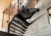 Modern home with Staircase, Metal Tread, Concrete Tread, and Metal Railing. Stairs were custom-fabricated and welded on-site during construction. Photo 5 of Skyline Residence