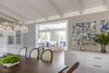 Modern home with Dining Room, Storage, Bar, Table, Pendant Lighting, Medium Hardwood Floor, and Gas Burning Fireplace. Forming Living Room turned Formal Dining Room Photo 4 of Danville Transitional Remodel