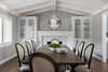 Modern home with Dining Room, Wall Lighting, Table, Medium Hardwood Floor, Pendant Lighting, and Gas Burning Fireplace. Formal Dining Room Photo 5 of Danville Transitional Remodel