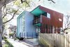 Modern home with Exterior, House Building Type, Flat RoofLine, Metal Roof Material, and Metal Siding Material. In a historic and flood prone city the Dorgenois residence is raised with most program on the second floor. The architects designed this home for themselves using it as a chance to experiment with Corten cladding and perforated screen, materials less common in this climate. Photo 2 of Dorgenois