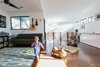 Modern home with Living Room, Ceiling Lighting, Sofa, and Dark Hardwood Floor. Second floor living spaces Photo 4 of Dorgenois