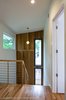 Modern home with Staircase, Wood Tread, Wood Railing, and Metal Railing. Stainless steel stair and White Oak accent wall Photo 9 of Tree House