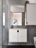 Modern home with Bath Room, Concrete Floor, Wood Counter, Drop In Sink, Concrete Wall, and One Piece Toilet. Main bathroom featuring natural, non-toxic marrakech render on walls and wet areas. Photo 6 of The 10 Star Home