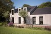 Modern home with Exterior, House Building Type, Wood Siding Material, and Tile Roof Material. Barnhouse Photo 4 of Villa Hindeloopen