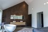 Modern home with Bath Room, Enclosed Shower, Ceiling Lighting, Vessel Sink, and Freestanding Tub. Bathroom - bedroom Photo 14 of Villa Hindeloopen