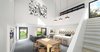 Modern home with Living Room, Sofa, Ceiling Lighting, and Concrete Floor. The interior space revolves around a vaulted, double-height space, located at the center of the home. Photo 2 of Culver City Modern