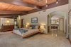 Modern home with Bedroom, Bed, Night Stands, Ceiling Lighting, Dresser, Track Lighting, Accent Lighting, Table Lighting, and Carpet Floor. Master Bedroom Photo 13 of Beautifully Designed Contemporary