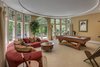 Modern home with Living Room, Sectional, Coffee Tables, Recessed Lighting, Ceiling Lighting, Floor Lighting, and Carpet Floor. Lounge Room Photo 8 of Beautifully Designed Contemporary
