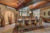 Modern home with Dining Room, Ceiling Lighting, Shelves, Lamps, Chair, Ceramic Tile Floor, and Accent Lighting. Dining Room Photo 7 of Beautifully Designed Contemporary