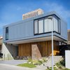 Modern home with Outdoor, Front Yard, Garden, Wood Patio, Porch, Deck, and Metal Patio, Porch, Deck. North Facade Photo 2 of Casa MA