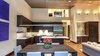 Modern home with Kitchen, Engineered Quartz Counter, Wood Cabinet, Medium Hardwood Floor, Ceiling Lighting, Pendant Lighting, Table Lighting, Accent Lighting, Wall Lighting, Recessed Lighting, Range, Refrigerator, Range Hood, Microwave, Dishwasher, Wine Cooler, Ice Maker, Undermount Sink, and Beverage Center. Main Level Living Area Photo 20 of Beaver Dam Luxury