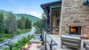 Modern home with Outdoor, Back Yard, Trees, Shrubs, Grass, Flowers, Boulders, Walkways, Post Lighting, Large Patio, Porch, Deck, Landscape Lighting, Stone Patio, Porch, Deck, and Hanging Lighting. Scene Stealer Photo 16 of Beaver Dam Luxury