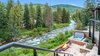 Modern home with Outdoor, Trees, Flowers, Shrubs, Back Yard, Boulders, Grass, Walkways, Gardens, Stone Patio, Porch, Deck, Large Patio, Porch, Deck, Landscape Lighting, Hanging Lighting, and Post Lighting. Unbelievable Property and Location Photo 17 of Beaver Dam Luxury