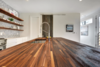 Modern home with Kitchen, White Cabinet, Dark Hardwood Floor, Wood Counter, Wood Cabinet, Mosaic Tile Backsplashe, Subway Tile Backsplashe, Ceramic Tile Backsplashe, Porcelain Tile Backsplashe, Ceiling Lighting, Recessed Lighting, Refrigerator, Microwave, Cooktops, Ice Maker, Dishwasher, Wine Cooler, Wall Oven, Range, and Range Hood. Kitchen Photo 3 of Johanna
