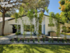 Modern home with Outdoor, Front Yard, Side Yard, Rooftop, Back Yard, Garden, Shrubs, Trees, Hardscapes, Grass, and Gardens. Exterior Photo 8 of Strass I