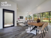 Modern home with Living Room, Chair, Bench, Sofa, Sectional, Console Tables, Recliner, Coffee Tables, End Tables, Ottomans, Floor Lighting, Table Lighting, Pendant Lighting, Ceiling Lighting, Wall Lighting, Track Lighting, Dark Hardwood Floor, Recessed Lighting, Light Hardwood Floor, and Medium Hardwood Floor. Living Room and Dining Room Photo 5 of Strass I