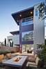 Modern home with Outdoor, Trees, Front Yard, Hardscapes, Shrubs, Large Patio, Porch, Deck, Flowers, Planters Patio, Porch, Deck, Concrete Patio, Porch, Deck, Walkways, Landscape Lighting, Horizontal Fences, Wall, and Stone Patio, Porch, Deck. entry courtyard Photo 5 of Westlake1
