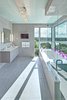 Modern home with Bath Room, Undermount Sink, Ceramic Tile Floor, Engineered Quartz Counter, Undermount Tub, Full Shower, Wall Lighting, Recessed Lighting, Ceiling Lighting, Ceramic Tile Wall, Marble Wall, Accent Lighting, and Glass Tile Wall. 3rd floor master bathroom Photo of Westlake1