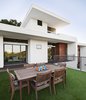 Modern home with Outdoor, Front Yard, Rooftop, Garden, Large Patio, Porch, Deck, Horizontal Fences, Wall, Grass, and Hardscapes. exterior/roof deck Photo 2 of Westlake4