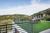 Modern home with Outdoor, Front Yard, Garden, Trees, Grass, Slope, Rooftop, Hardscapes, Horizontal Fences, Wall, and Large Patio, Porch, Deck. roof deck/view Photo 3 of Westlake4