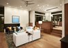 Modern home with Chair, Coffee Tables, Sofa, End Tables, Recessed Lighting, Light Hardwood Floor, Carpet Floor, Corner Fireplace, Ribbon Fireplace, Gas Burning Fireplace, Dining Room, Bar, and Storage. living Photo 8 of Westlake4