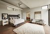 Modern home with Bedroom, Bed, Night Stands, Chair, Bench, Lamps, Recessed Lighting, Light Hardwood Floor, Accent Lighting, and Carpet Floor. master bedroom 1 Photo 11 of Westlake4