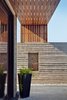 Modern home with Outdoor, Back Yard, Shrubs, Large Patio, Porch, Deck, Horizontal Fences, Wall, and Landscape Lighting. solar screen Photo 3 of Mueller 1