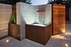 Modern home with Outdoor, Back Yard, Shrubs, Hardscapes, Raised Planters, Walkways, Gardens, Concrete Pools, Tubs, Shower, Small Pools, Tubs, Shower, Large Patio, Porch, Deck, Wood Patio, Porch, Deck, Concrete Patio, Porch, Deck, Horizontal Fences, Wall, Stone Patio, Porch, Deck, Landscape Lighting, Metal Patio, Porch, Deck, and Metal Fences, Wall. fountain/gate Photo 7 of Mueller 1