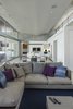 Modern home with Living Room, Sofa, Sectional, Ceiling Lighting, Ceramic Tile Floor, and Coffee Tables. main wing looking toward the dining and kitchen area from the living area Photo 8 of The U V House