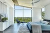 Modern home with Bedroom, Bed, Dresser, Night Stands, Chair, Ceiling Lighting, and Ceramic Tile Floor. master bedroom Photo 13 of The U V House