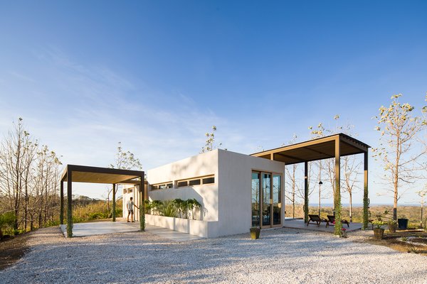 This project by Studio Saxe elegantly combines modern methods of construction with local materials and techniques. Villa Saxo is defined by an exoskeleton pergola structure that provides shade over large terraced areas while also creating a frame for the local flora to grow around.