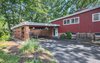Modern home with Outdoor, Front Yard, Slope, and Hanging Lighting. Carport Photo 2 of Classic Mid Century Modern home for sale