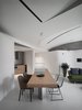 Modern home with Dining Room, Chair, Ceiling Lighting, Table, Bar, and Concrete Floor. The living space is equipped with a home cinema and a mini bar to enhance the entertainment facilities for social activities. Photo 3 of Fluid House
