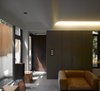 Modern home with Living Room, Sofa, Ceiling Lighting, and Concrete Floor. The client wanted to reserve the original structure, intended not to add excessive complexities and luxuries, and eventually expected to see "A Simple House". Photo 7 of Simple House