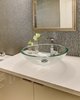 Modern home with Bath Room, Engineered Quartz Counter, and Vessel Sink. The Grizzel and Mann wallcovering stands out against the Cambria quartz countertops in the master bathroom. Photo 8 of Modern Infusions