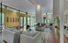 Modern home with Medium Hardwood Floor, Two-Sided Fireplace, Wood Burning Fireplace, Windows, and Wood. 'Mountain House' - Living Room Photo 3 of Mountain House Modern