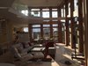 Modern home with Living Room, Recliner, Sectional, Coffee Tables, Chair, End Tables, Light Hardwood Floor, Ceiling Lighting, and Accent Lighting. Living room (alternate view) Photo 6 of Amagansett Beach House