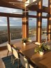 Modern home with Dining Room, Chair, Table, Ceiling Lighting, and Light Hardwood Floor. Dining area overlooking Napeague Bay Photo 7 of Amagansett Beach House